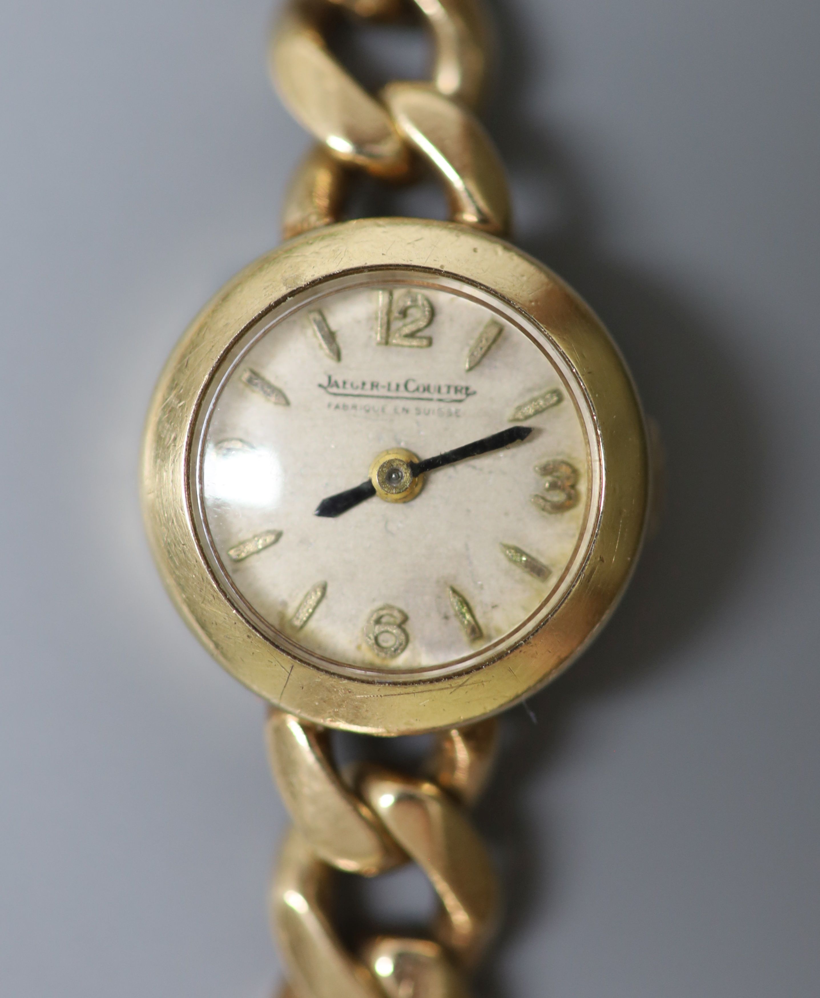 A lady's 1960's 9ct gold Jaeger LeCoultre manual back wind wrist watch, on associated 9ct gold curb link bracelet, overall 16.2cm, gross weight 19.2 grams, with Jager LeCoultre box